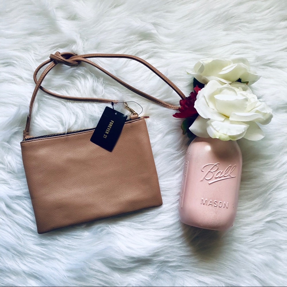 Forever 21 tan crossbody bag .